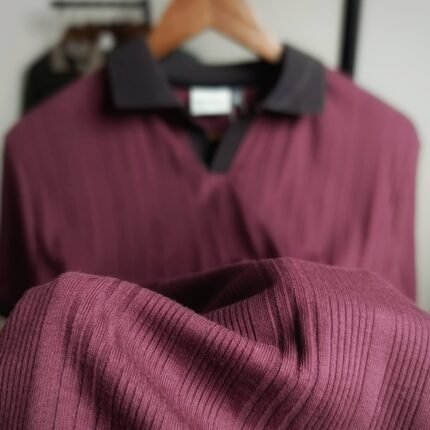 Premium Burgundy Old Money Polo ribbed knit shirt with a contrast dark collar hanging on a wooden hanger